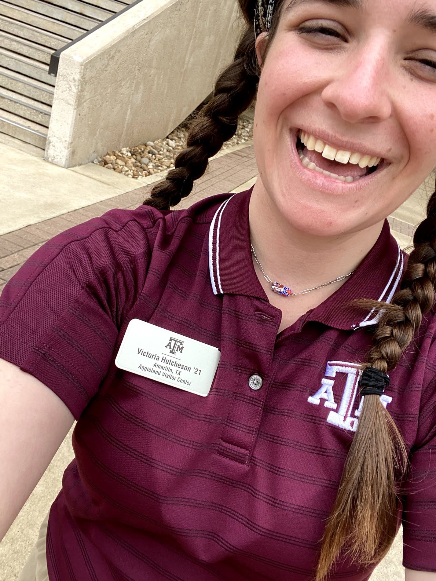 Student takes a selfie as a campus tour guide.